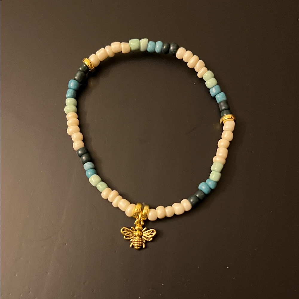 Hand Crafted Gold Bee Charm Bracelet with Cream and Blue Beads